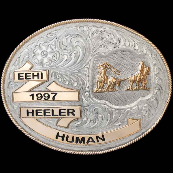 The Rogersville Belt Buckle exudes western class & elegance. This shiny silver belt buckle features detaitled bronze banners and a hand engraved base. Personalize this belt buckle now!